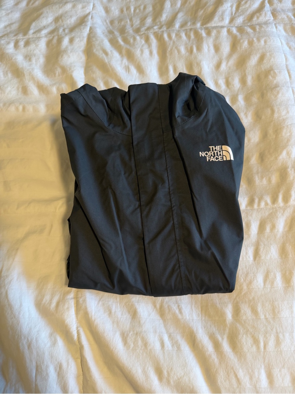 The North Face boys Black Hooded Raincoat with Logo